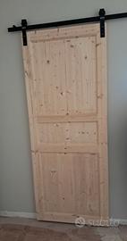 Porta scorrevole in legno con guida