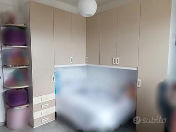 Armadio a ponte angolare per cameretta