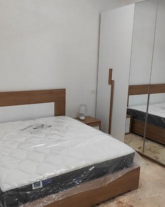 Oleggio, stanza con letto matrimoniale