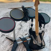 Xbox 360 con rock band e vari giochi.