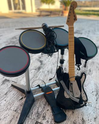Xbox 360 con rock band e vari giochi.