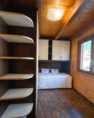 Armadiatura a ponte con letto singolo ad incasso
