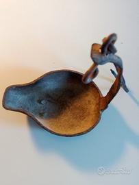 Antica lucerna a olio