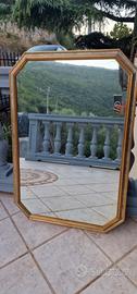 Specchio con cornice in legno