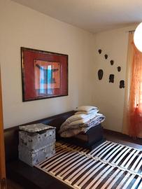 Letto giapponese con comodini