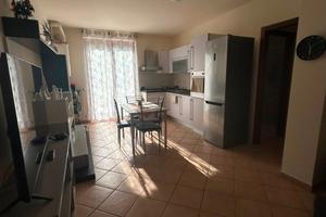 Bilocale arredato con giardino, box e cantina