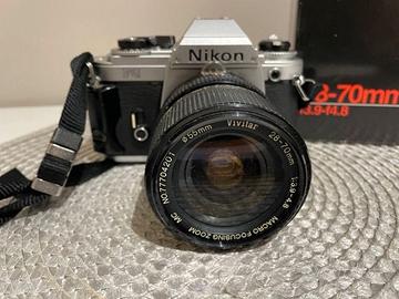 Nikon FG-20 con zoom 28-70mm