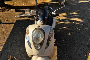 Sym Mio 100