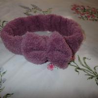 Fascia per capelli viola con fiocco