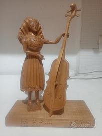 statua intagliata a mano legno