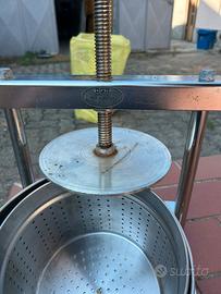Schiacciatore per alimenti