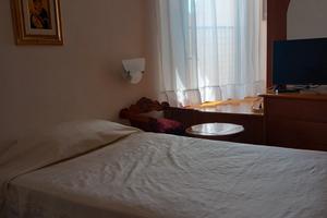 Camera singola con bagno in comune