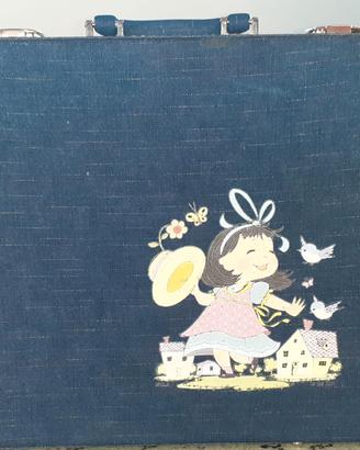 Album portafoto in jeans con valigetta abbinata