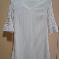 Abito con maniche intagliate