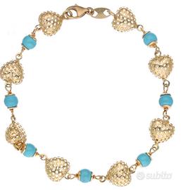 Bracciale a cuori tridimensionali oro ,18kt