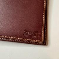 Portafoglio in pelle marrone color cuoio Sisley
