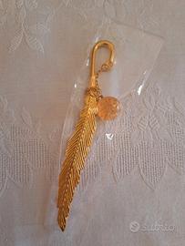 Segnalibro piuma dorata elegante