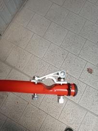 asta per insegnare a pedalare