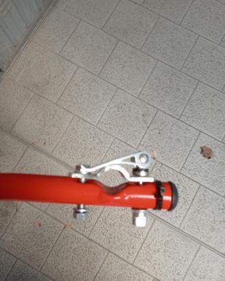asta per insegnare a pedalare