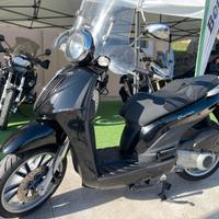 Piaggio Carnaby 300/2009 & Kymco Agility 150/2010