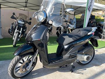 Piaggio Carnaby 300/2009 & Kymco Agility 150/2010