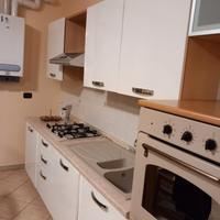 Cucina, camera da letto, soggiorno 