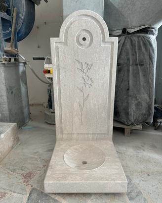 Fontana in pietra da parete
