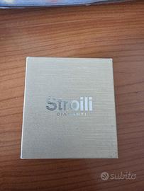 Anello stroili oro bianco e diamanti 0,095kt