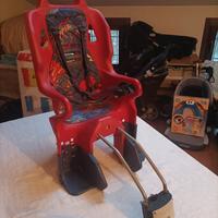 Seggiolino bici con attacco rapido + due caschetti