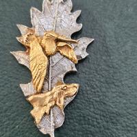 decorazione in oro 18k e argento