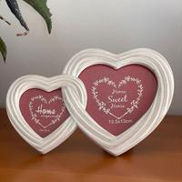 Cornice portafoto a doppio cuore