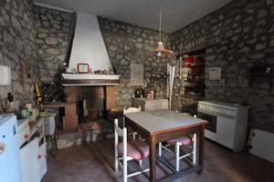 Casa con pietre a vista 