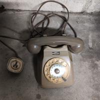 vecchio telefono a disco girevole rotella vintage