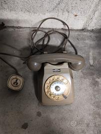 vecchio telefono a disco girevole rotella vintage