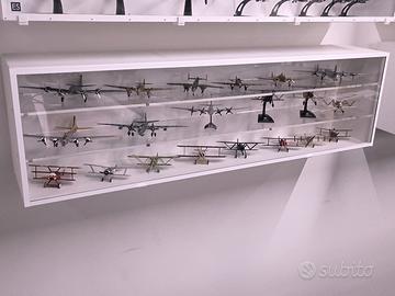 ESPOSITORE ANTIPOLVERE DA PARETE