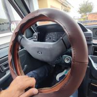 coprivolante in pelle marrone