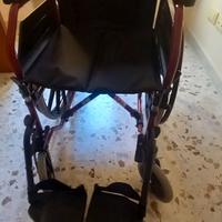 Sedia a rotelle pieghevole