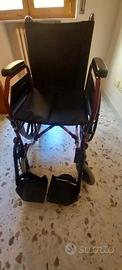 Sedia a rotelle pieghevole
