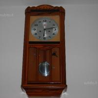 Orologio a pendolo antico