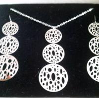 completo orecchini e colliere in acciaio