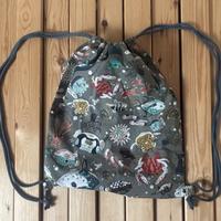 Sacca tessutio tema marino  con cordoncino