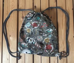 Sacca tessutio tema marino  con cordoncino