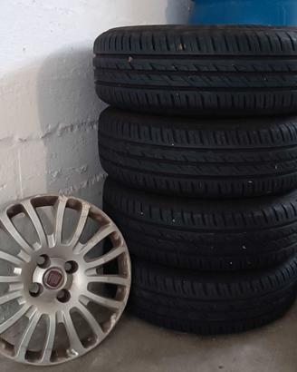 4 cerchi completi fiat grande punto