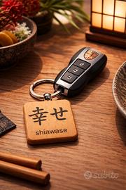 Portachiavi giapponese in legno "felicità"