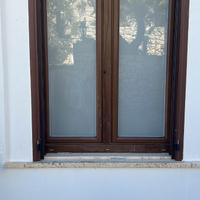 Finestra in pvc con zanzariera e persiana in allum