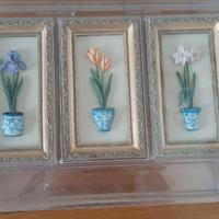 3 quadretti con vasi di fiori