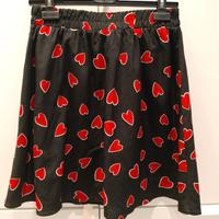 Gonna nera con cuori rossi