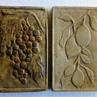 Bassorilievi jn pietra uva e limoni