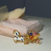 Spilla Calesse in Oro 18 carati 