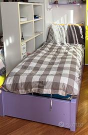 Due letti singoli con contenitore